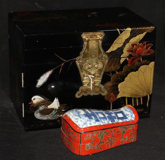 A Japanese lacquered jewellery cabinet and a Chinese lacquered box in the form of a pillow